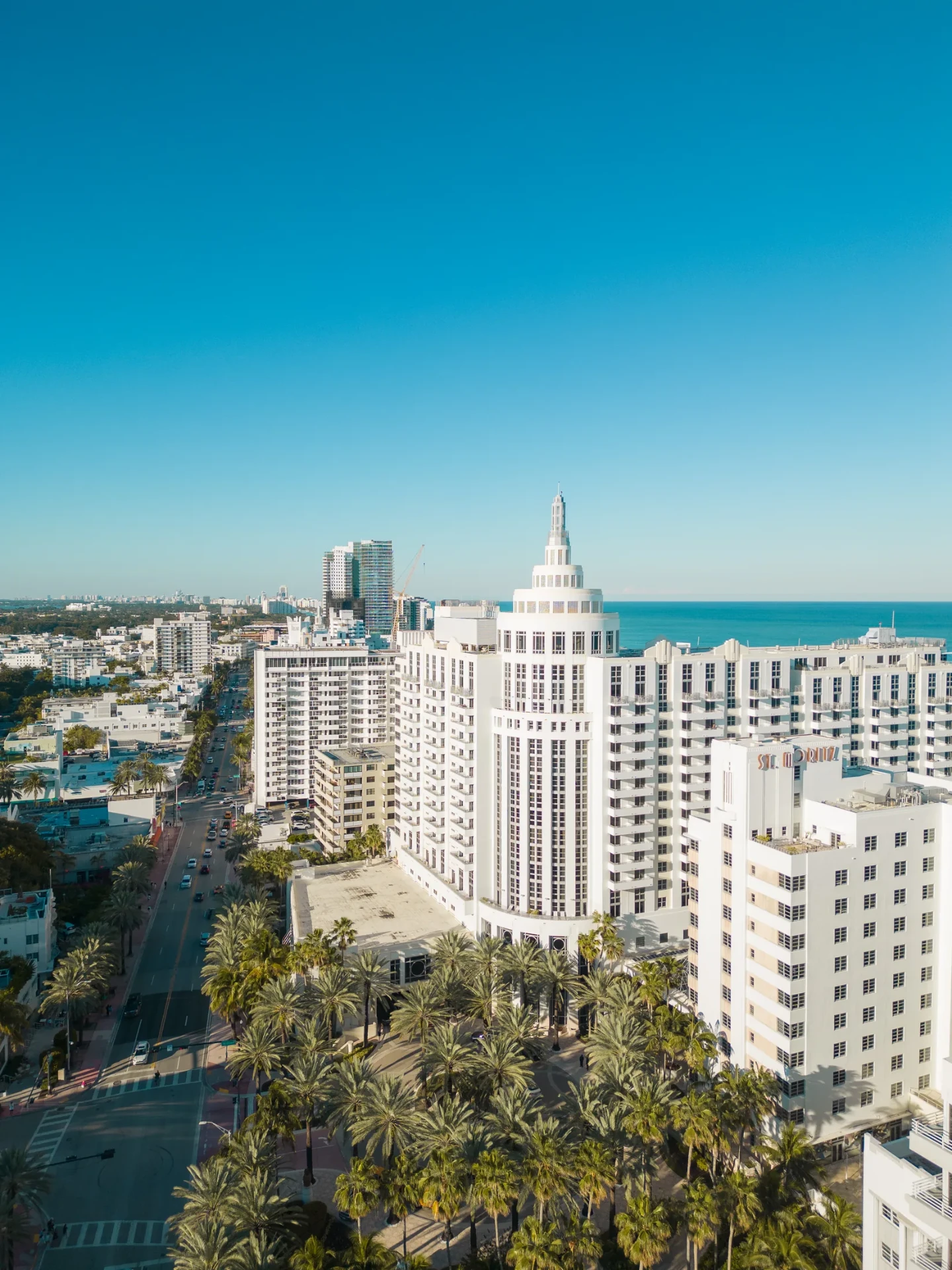 Aerial drone photo of the Loews Miami Beach hotel and its Art Deco St. Moritz tower on Collins Avenue, Atlantic behind